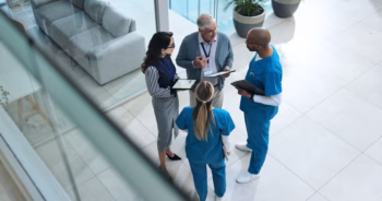Doctors, medical team and tablet with discussion.